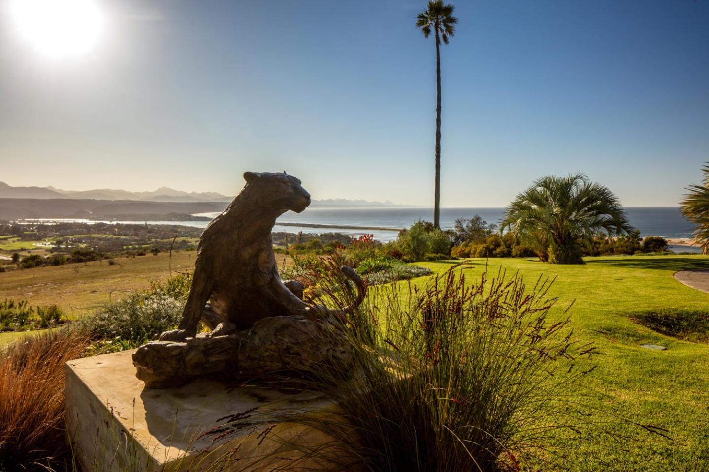 Sky Villa Boutique Hotel By Raw Africa Collection Plettenberg Bay Kültér fotó The Bobcat statue at the entrance of the school